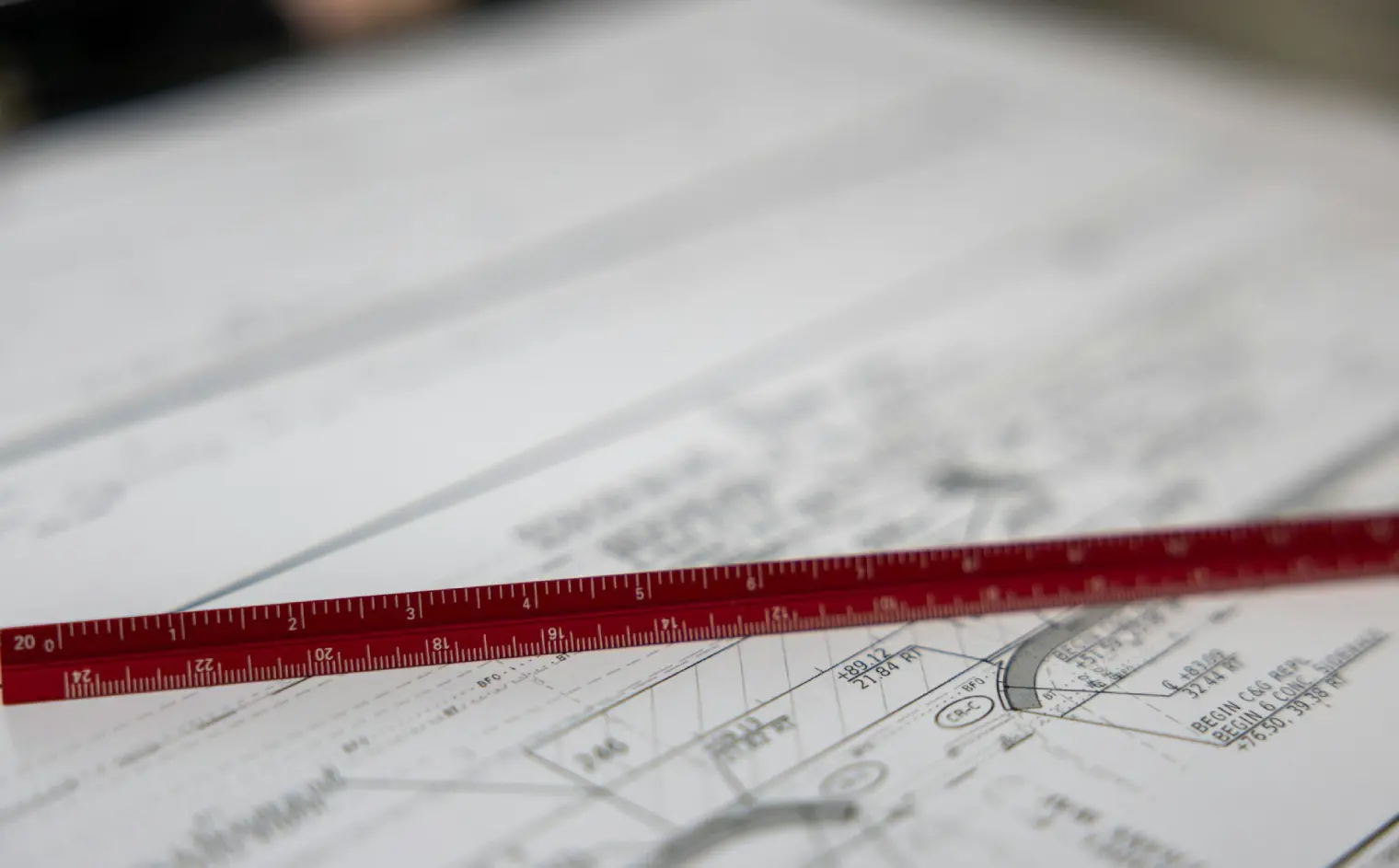 Construction estimator reviewing digital plans on a tablet