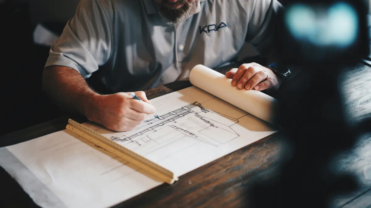 Architect reviewing an AI-generated building render
